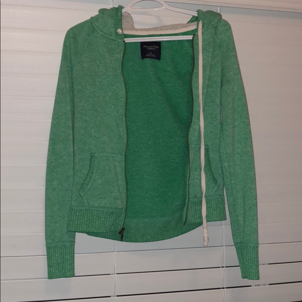 green sweatshirt